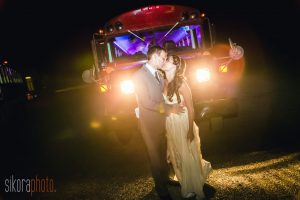 Couple kissing Wedding transportation in Portland